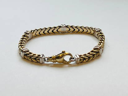 14k Yellow and White Gold Link Bracelet, D.A.G. Italy: 14k Yellow and White Gold Link Bracelet, Stamped D.A.G. Italy Length 7.5 in. 18.22 dwt Provenance: The Estate of Jean M. Valerio, Wellesley, Massachusetts
