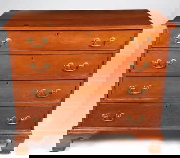 American Chippendale Cherry Wood Chest of Drawers, early 19th Century: American Chippendale Cherry Wood Chest of Drawers, early 19th Century, with overhanging molded top with four graduated drawers with brass bail hardware, on high bracket feet Height 35 in. Width 39 in.