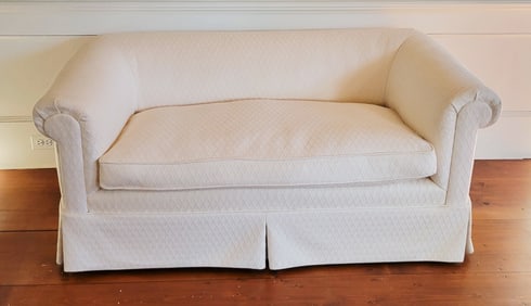 Designer Creme Upholstered Single Cushion Skirted Settee with Rolled Arms