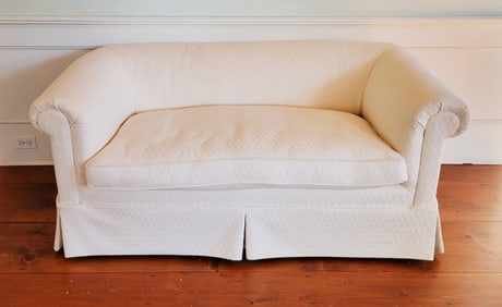 Designer Creme Upholstered Single Cushion Skirted Settee with Rolled Arms