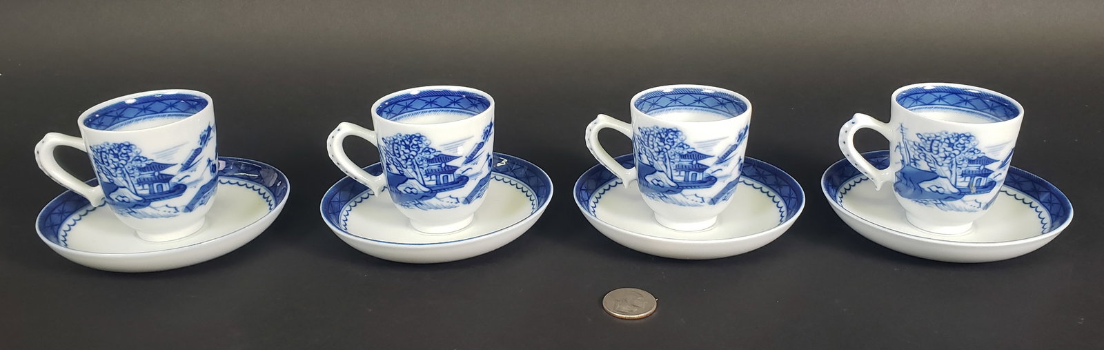 Set of Four Mottahedeh Canton Style Tea Cups and Saucers: Set of Four Mottahedeh Canton Style Tea Cups and Saucers, each signed Portugal. Cups Height 2.5 in. Width 3.5 in. Saucer Diameter 4.75 in.