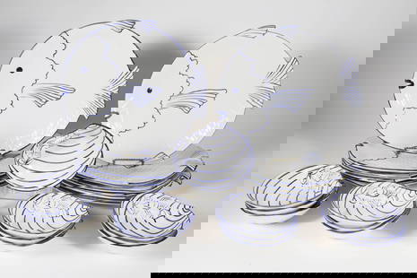 Italian Ceramic Blue and White Fish-Form Dinner Plates and Clamshell Bowls: Italian Ceramic Blue and White Dinner Service Comprising: ten fish-form plates and thirteen clamshell form bowls with applied lobsters, stamped underneath: Made in Italy Diameter 6.5 in. and 12.5 in.
