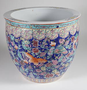 Vintage Chinese Enamel Paint Decorated Planter: Vintage Chinese Enamel Paint Decorated Planter, the interior decorated with carp, the exterior with flowers and butterflies Height 12 in. Diameter 14 in. Provenance: Collection of Susan Akers, 7 Pleas