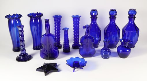 Fifteen Pieces of Vintage Cobalt Glass Including Vases, Decanters and Paperweight