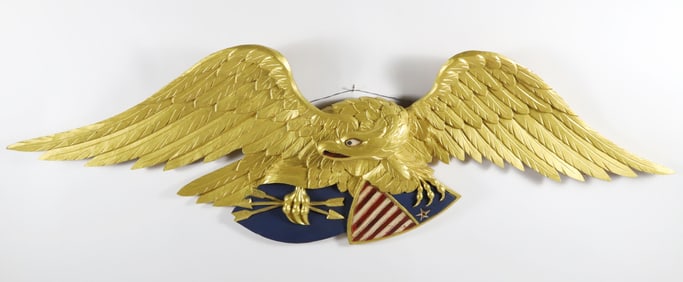 Carved Wood and Gilt Spread Winged Eagle Clutching a Federal Shield and Arrows