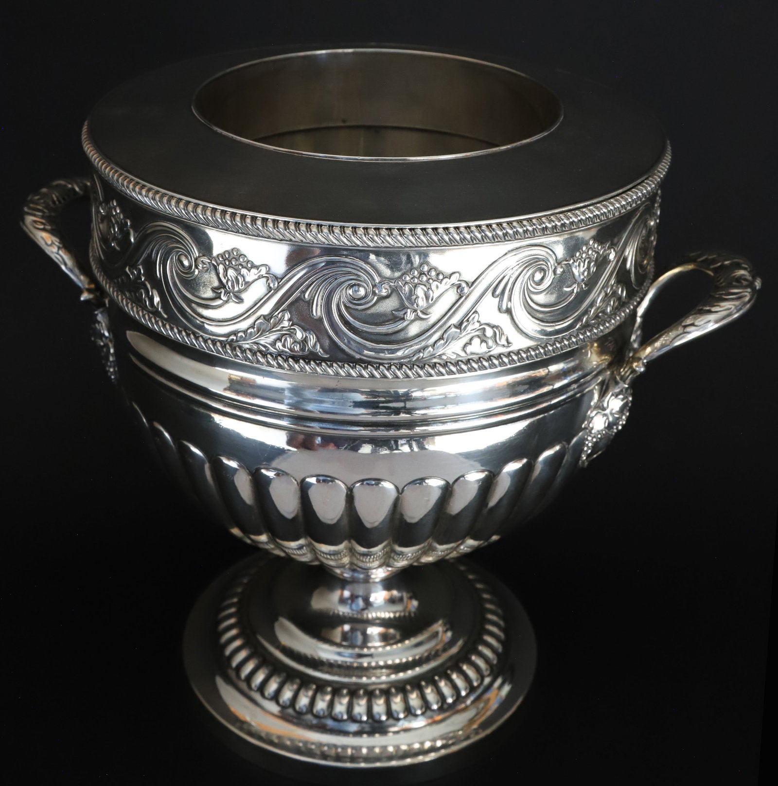 Antique Silver Plated Wine Chiller, 19th Century: Antique Silver Plated Wine Chiller, 19th Century, in two sections, repousse scrolls and grapes, gadrooning, melon body and grape and leaf applied handles Height 10 in. Diameter 11 in. Opening Diameter