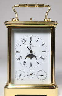Tiffany & Co. 11 Jewels Brass Carriage Clock: Tiffany &amp; Co. 11 Jewels Brass Carriage Clock, stamped: Unadjusted Swiss Made, and stamped on the mechanism Tiffany &amp; Co. Switzerland #1751/81 Height 5 in. Width 4 in. Depth 3 in.