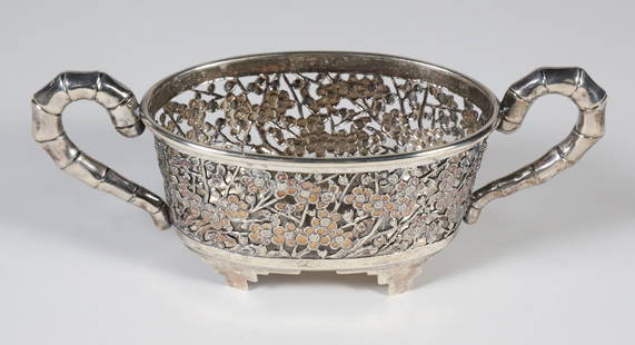 Chinese Export Silver Reticulated Two Handle Cherry Blossom Bowl, Signed Luen Wo: Chinese Export Sterling Silver Reticulated Oval Cherry Blossom Bowl, Signed Luen Wo, with bamboo form handles Length 6 in. 2.5 Troy Ounces Provenance: Collection of Susan Akers, 7 Pleasant Street, Nan