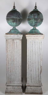 Pair of Architectural Green Patina Copper Ball Finials, 19th Century: Pair of Architectural Green Patina Copper Ball Finials, 19th Century, mounted on fluted carved wood pedestals Finials 30 in. x 13.5 in. x 13.5 in. Overall Height 84.5 in.