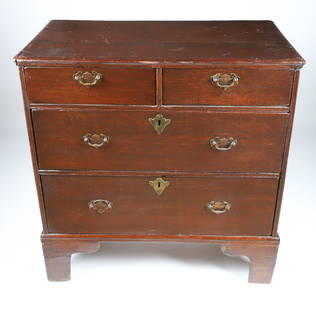 Diminutive English Oak Chest of Four Drawers, 18th Century: Diminutive English Oak Chest of Drawers, 18th Century, two over two drawers on bracket feet, brass key-hole escutcheons and post and bale hardware Height 31 in. Width 30 in. Depth 17.5 in.