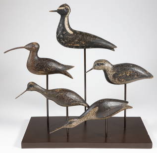 Collection of Five Antique Carved and Painted Shorebird Decoys: Collection of Five Antique Carved and Painted Shorebird Decoys, on contemporary stand Largest Bird Height 8 in. Width 5.5 in. Stand 17 in. x 7 in.
