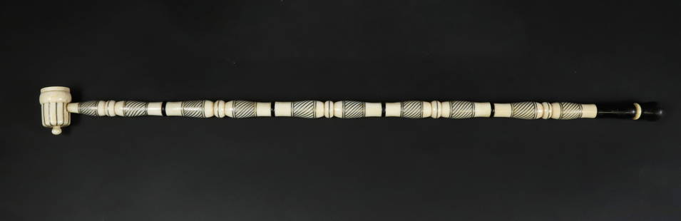 Chinese Opium Pipe, 18th Century: Chinese Opium Pipe, 18th Century, inlaid throughout with twisted silver, constructed with five sections and bowl and mouth piece Length 18.5 in.
