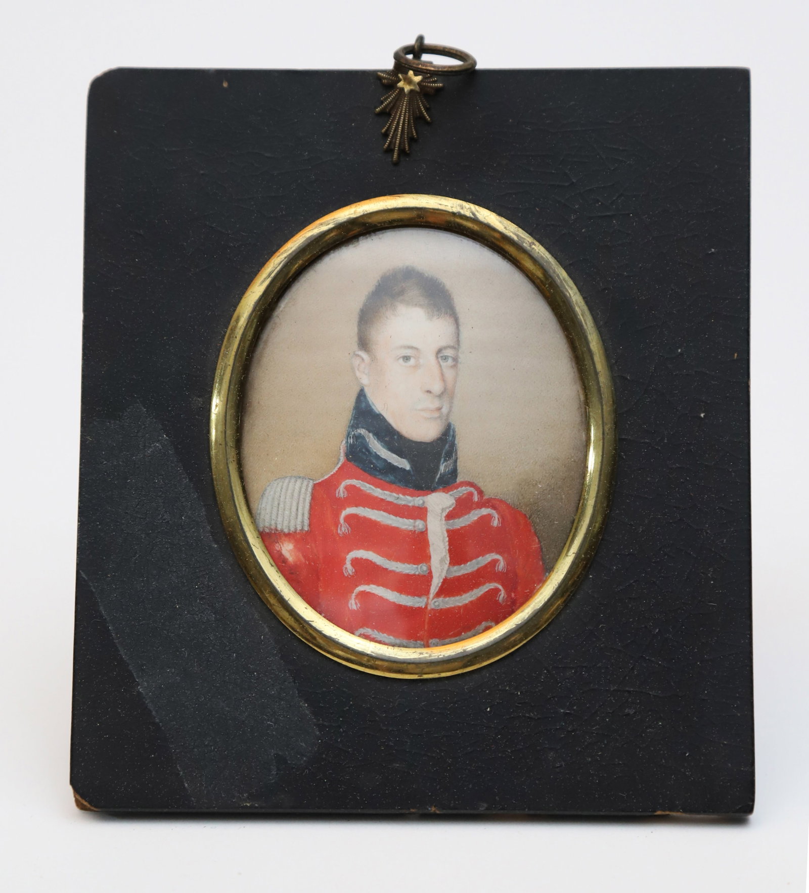 Stuart Ers Rins - London Miniature Military Portrait, 19th Century: Stuart Ers Rins - London Miniature Military Portrait, 19th Century,?an officer of the East India Co. in scarlet uniform, in ebonized frame with starburst hanger 3 in. x 2.5 in. Framed 5.25 in. x 4.75 