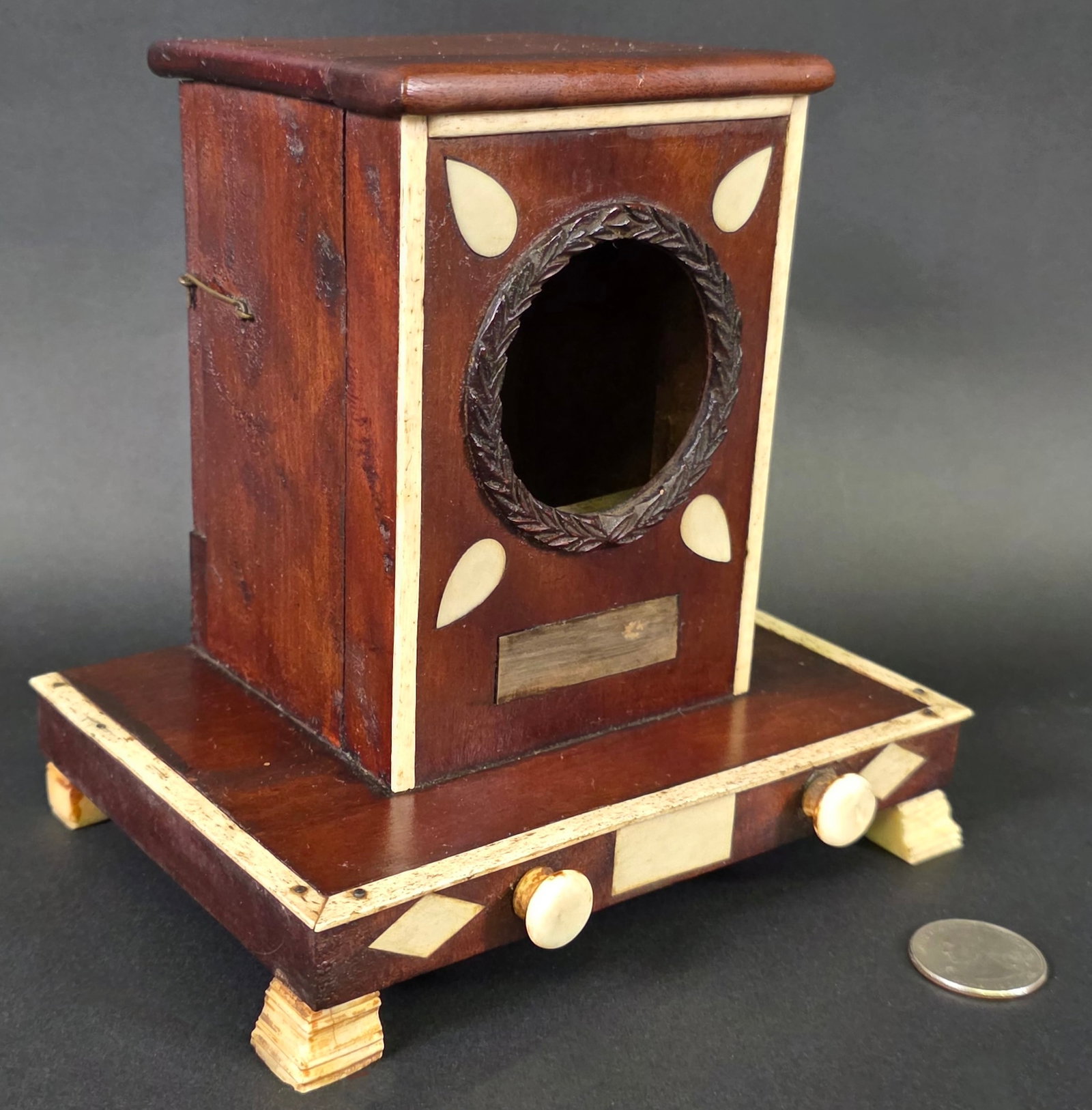 Antique Sailor Made Watch Hutch Tower, 19th century: Antique Sailor Made Watch Hutch Tower, 19th century, mahogany, baleen and bone construction, with diamond and teardrop inlays, on bracket feet. Height 6.25 in. Width 6 in. Depth 4.5 in.