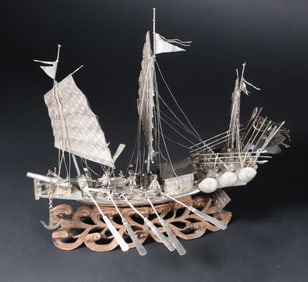 Antique Chinese Silver Model of a War Junk on Carved Teak Wood Ocean Wave Base