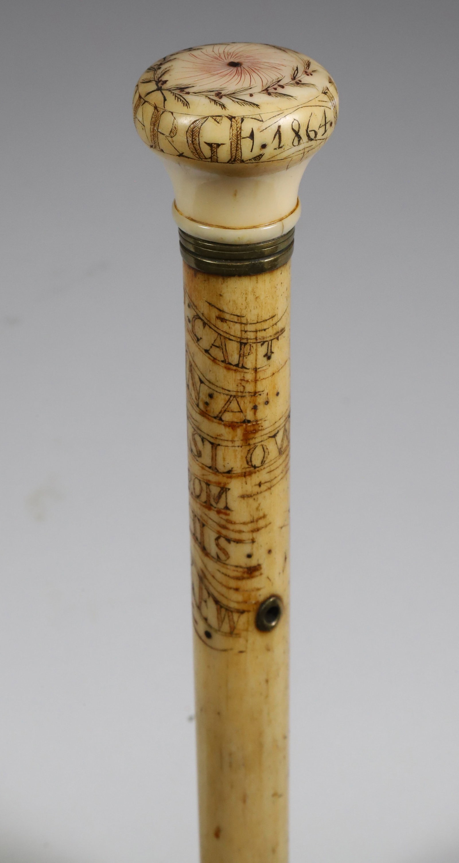Whaler Made "USS Kearsarge" Walking Stick, circa 1864: Whaler Made "USS Kearsarge" Walking Stick, circa 1864, the antique whale ivory scrimshawed knob engraved: USS Kearsarge, 1864, the whale bone shaft engraved: To Capt. John A. Winslow From His Crew Len