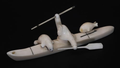 Vintage Inuit Carved Eskimo Hunter in Kayak