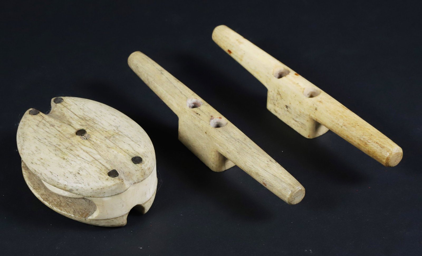 Pair of Whale Cleats Accompanies with Whalebone Block and Antique Ivory Sheave, 19th Century: Pair of Whale Cleats Accompanies with Whalebone Block and Antique Ivory Sheave, 19th Century Cleats Length 6 in. Block 3.25 in.