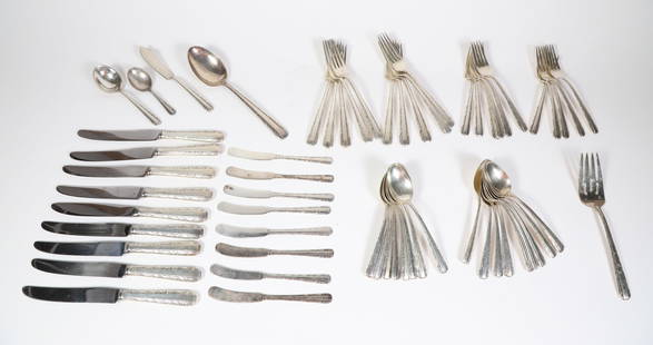 Towle Sterling Silver Flatware Service in the Candlelight Pattern: Towle Sterling Silver Flatware Service in the Candlelight Pattern, partial service for nine, comprising; 10 dinner forks 9 dinner knives 11 salad forks 17 teaspoons 8 butter knives