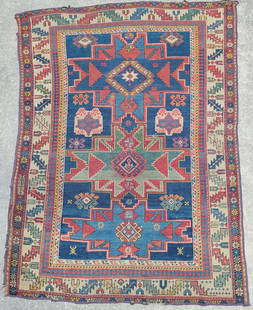 Antique Caucasian Lesghi Star Oriental Carpet Rug: Antique Caucasian Lesghi Star Oriental Carpet Rug, circa early 1900s, flower and vine border with geometric stylized star designs on blue field. 3 ft. 8 in. x 5 ft