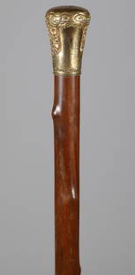 Gold Pinpricked Walking Stick, circa 1864: Gold Pinpricked Walking Stick, circa 1864, the top engraved: Wm Lee, 1864, the sides engraved: Benjamin, Edwin, Lucy, Mary and Esther, within chiseled floral panels, on faux bamboo shaft with small fe