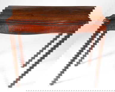 Mahogany Hepplewhite Serpentine Game Table, 19th Century: Mahogany Hepplewhite Serpentine Game Table, 19th Century, on reeded legs Height 29 in. Width 35 in. Depth 18 in.