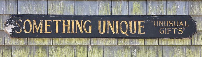 Vintage Carved and Painted Something Unique Quarterboard Trade Sign, 20th century