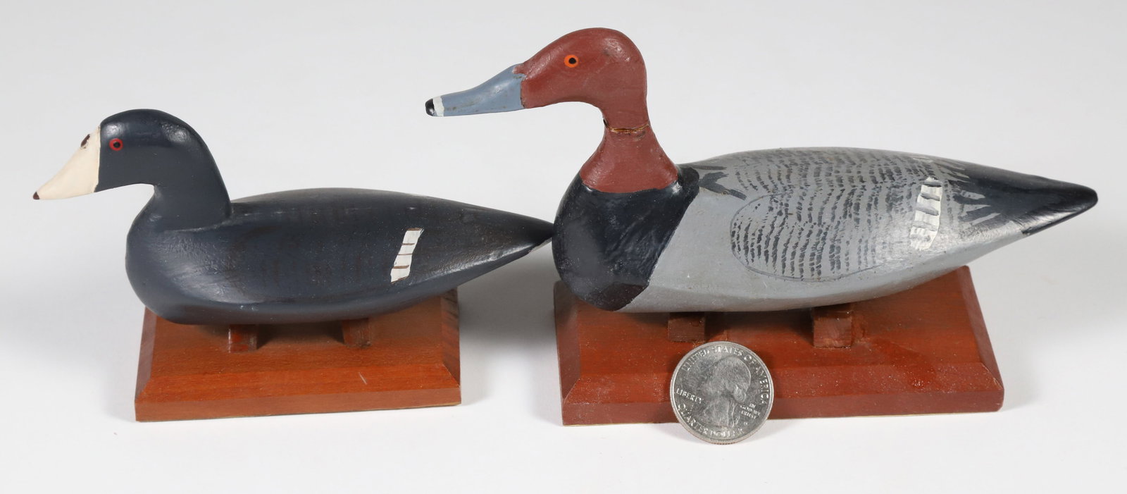 Pair of Dr. John Carriere Carved Miniature Duck Decoys (1 of 4)