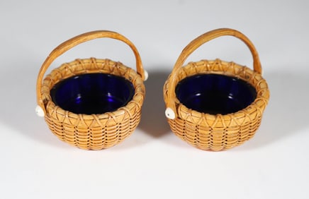 Pair of Paul Willer Nantucket Basket Woven Open Salts with Swing Handles and Cobalt Glass Liners