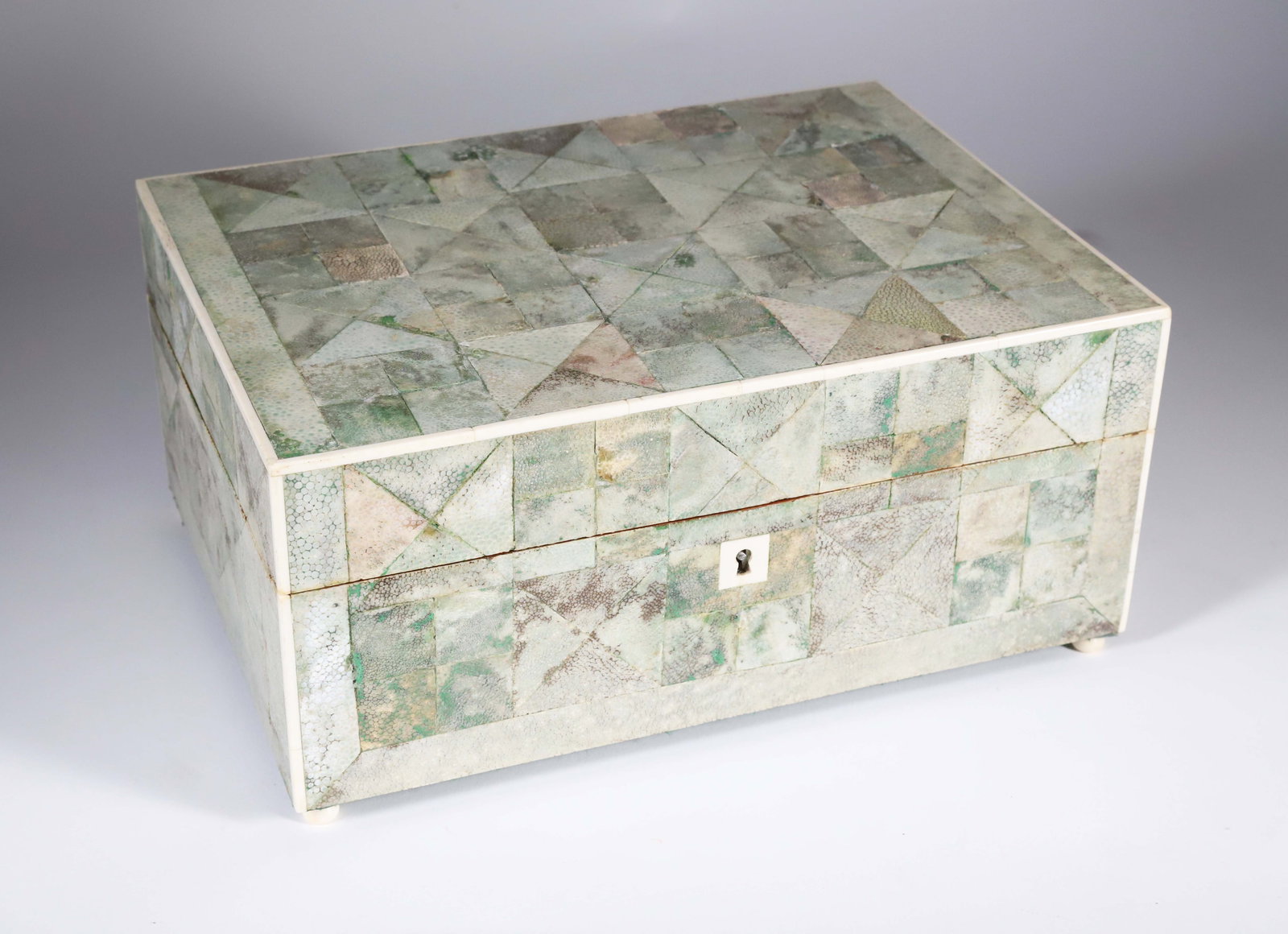 Antique Shagreen Sewing Box, early 19th Century: Antique Shagreen Sewing Box, early 19th Century, hinged lid exposing a silk fabric and silver paper, removable sewing component tray Height 5 in. Width 11.5 in. Depth 8.25 in.