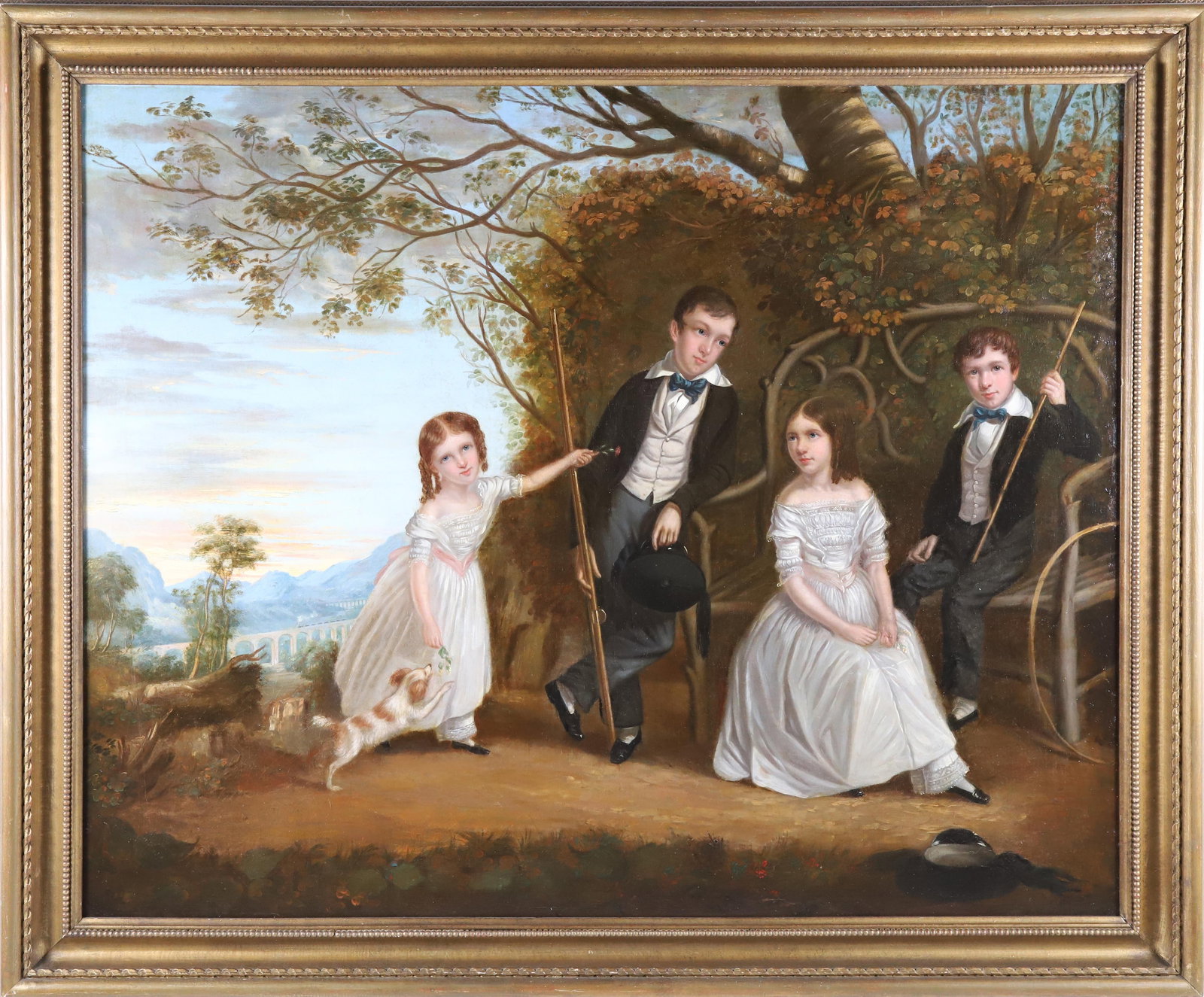 British School Oil on Canvas "Family Portrait in the Scottish Highlands", circa 1900: British School Oil on Canvas "Family Portrait in the Scottish Highlands", circa 1900, depicted in the distance is the Glenfinnian Railway Viaduct, which was completed in 1898. 33 in. x 41.5 in. Framed