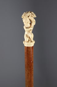 Finely Carved Child Holding Horn of Plenty Walking Stick, 19th Century