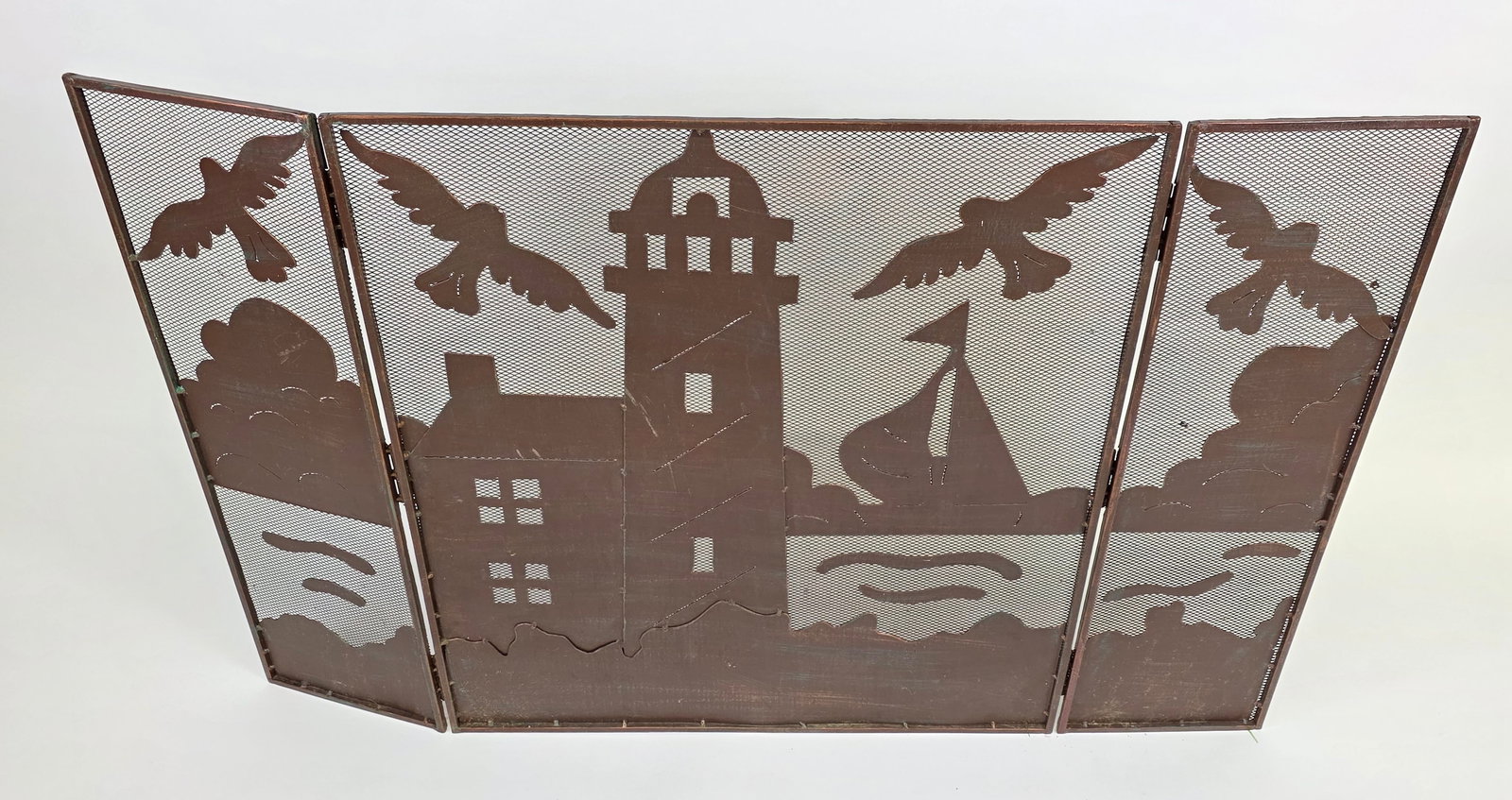 Copper Nautical Lighthouse and Sailboats Folding Fire Screen: Copper Nautical Lighthouse and Sailboats Folding Fire Screen 30 in. X 46.5 in.