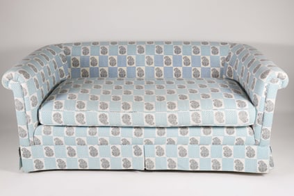 Blue and White Upholstered Rolled Arm Single Cushion Skirted Sofa