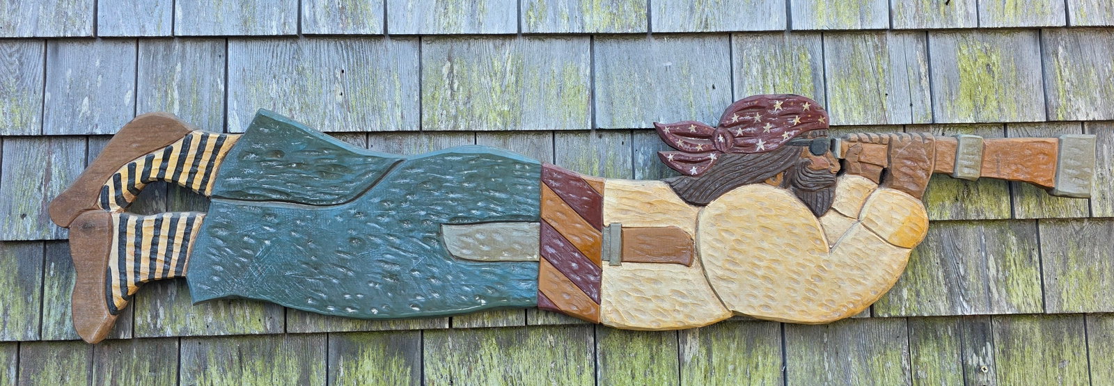 David Small Carved & Painted Folk Art Nantucket Pirate Plaque: David Small Carved & Painted Folk Art Nantucket Pirate Plaque, carved wood with painted decoration, signature on reverse. 14 in. X 47.5 in.