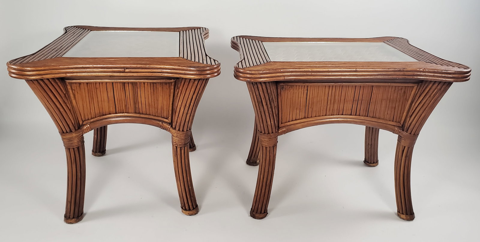 Pair of Vintage Rattan and Bamboo Porringer Top End Tables, 20th century: Pair of Vintage Rattan and Bamboo Porringer Top End Tables, 20th century, with cross hatched decorative tops. Height 22 in. Width 29 in. Depth 23.5 in.