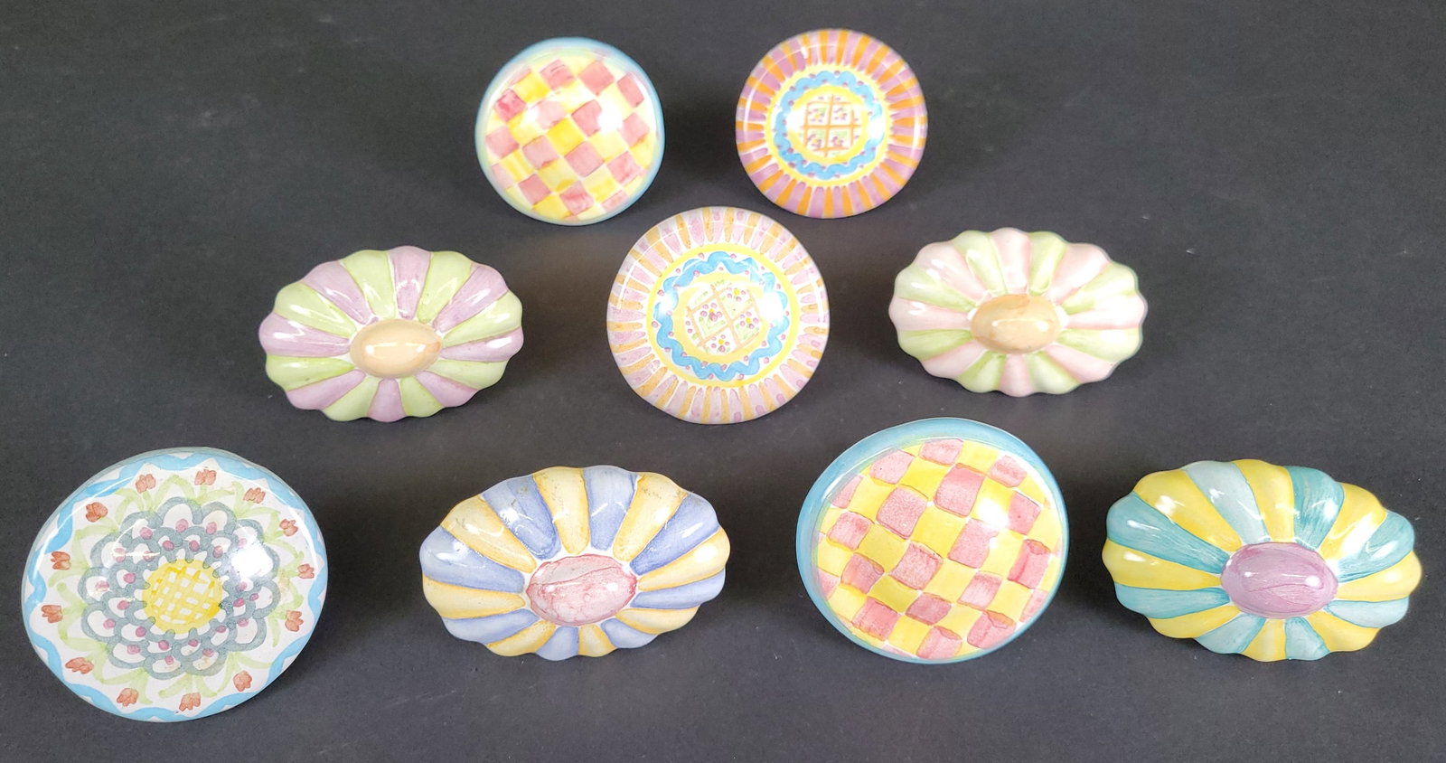 Vintage Mackenzie Childs Hand Decorated Ceramic Furniture Knob Drawer Pulls: Vintage Mackenzie Childs Hand Decorated Ceramic Furniture Knob Drawer Pulls, fun colors and designs, each with impressed Mackenzie Childs mark and 1995/1996 dates on reverse sides. Diameters 2.5 in. a