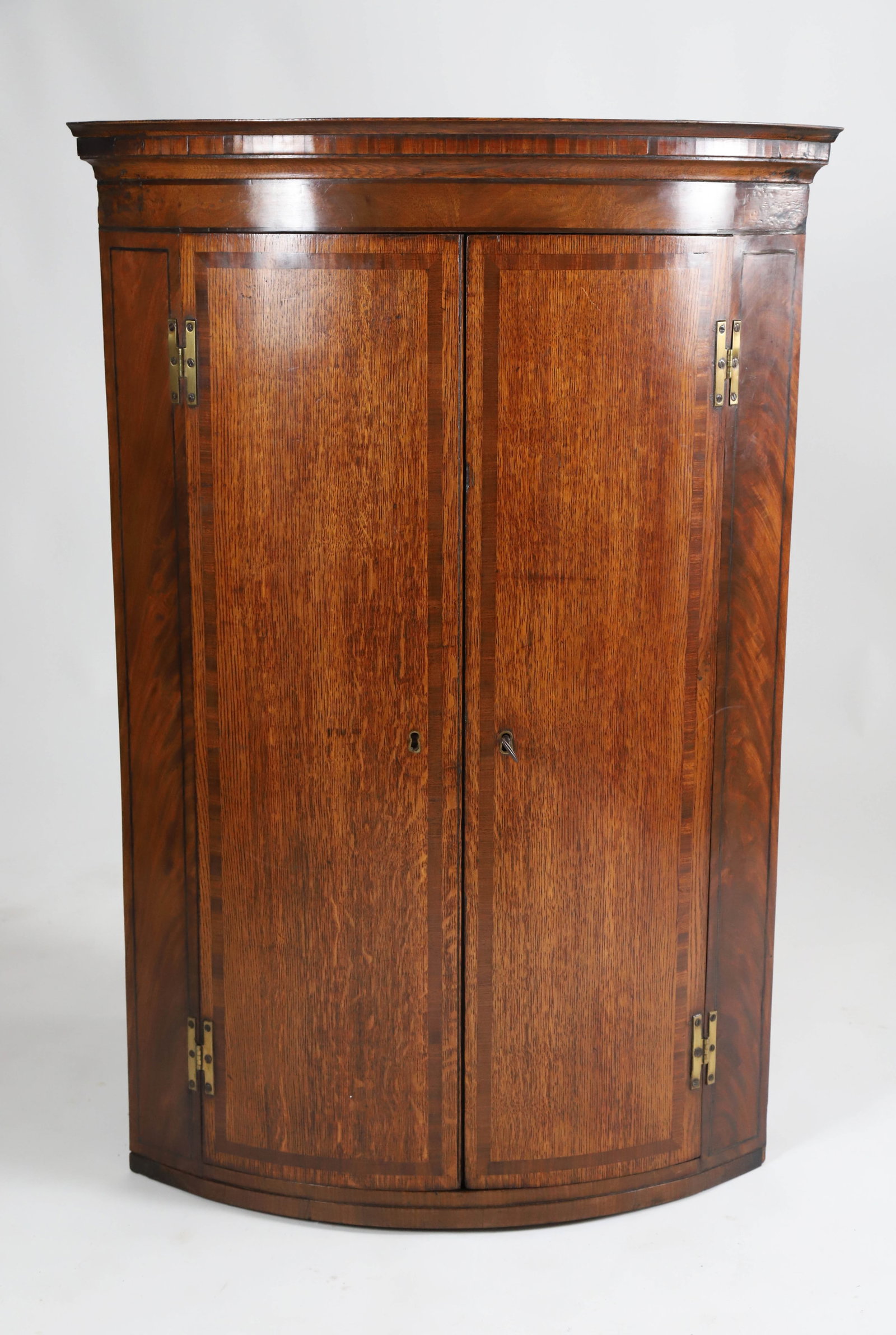 Antique English Oak Hanging Corner Cabinet, 19th Century: Antique English Oak Hanging Corner Cabinet, 19th Century Height 41.5 in. Width 28 in. Depth 19 in.