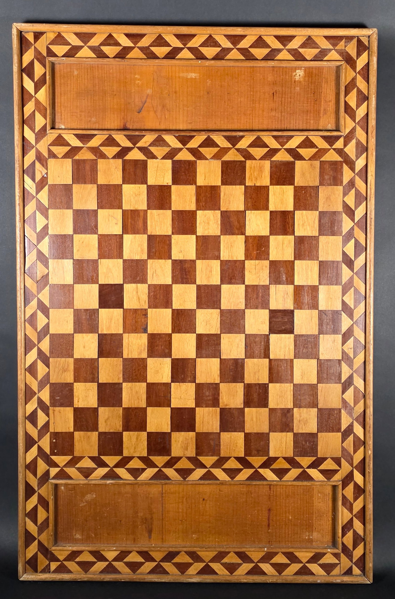 Large Antique Multiwood Inlaid Gameboard, 19th century: Large Antique Multiwood Inlaid Gameboard, 19th century, with sawtooth border. 22 in. X 34.5 in.