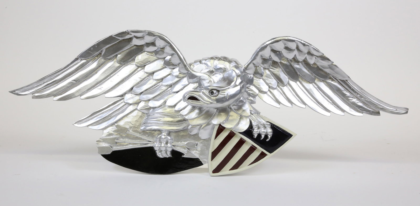 Louisburg Style Silver Gilt Carved Spread Winged Eagle: Louisburg Style Silver Gilt Carved Spread Winged Eagle, 20th Century, depicted clutching a red, white and blue Federal shield Height 9 in. Width 25 in.