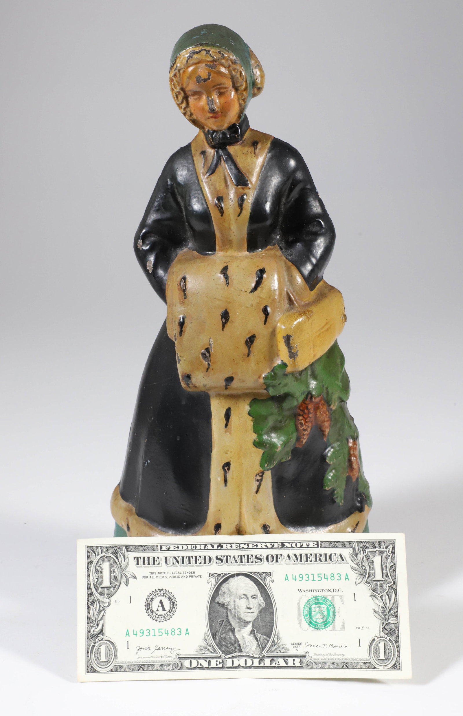 Antique Albany Foundry Painted Cast Iron Colonial Woman Doorstop: Antique Albany Foundry Painted Cast Iron Colonial Woman Doorstop, in original paint Height 12 in.