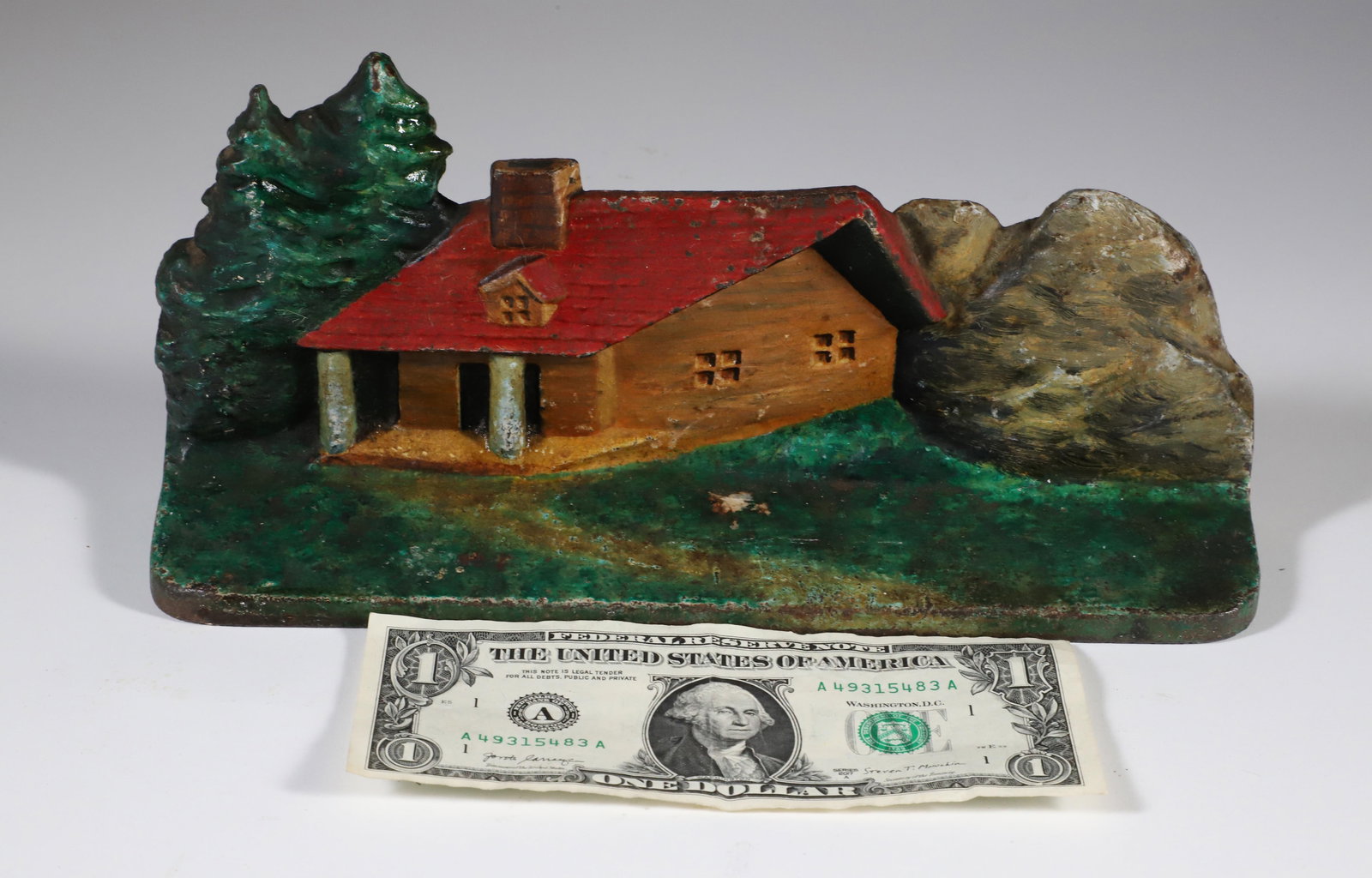 Antique Cast Iron Painted Adirondack Log Cabin Doorstop: Antique Cast Iron Painted Adirondack Log Cabin Doorstop, stamped DS14 on reverse Height 4.5 in. Width 10 in.