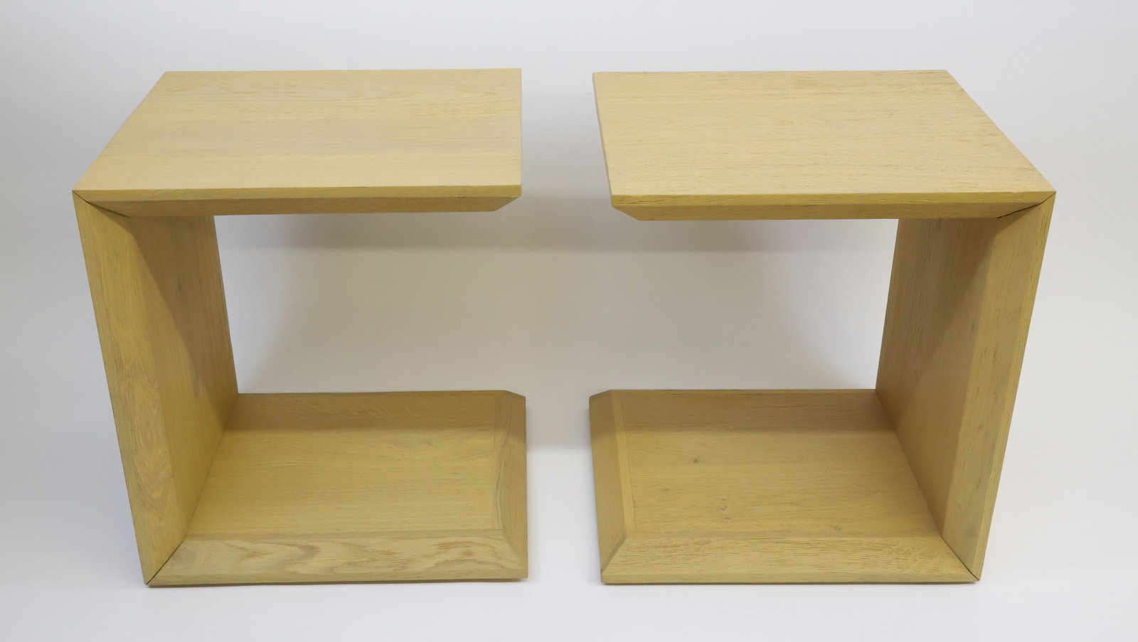 Pair of Blonde Contemporary "C" Shaped Side Tables: Pair of Blonde Contemporary "C" Shaped Side Tables Height 23 in. Width 18.5 in. Depth 19.5 in.