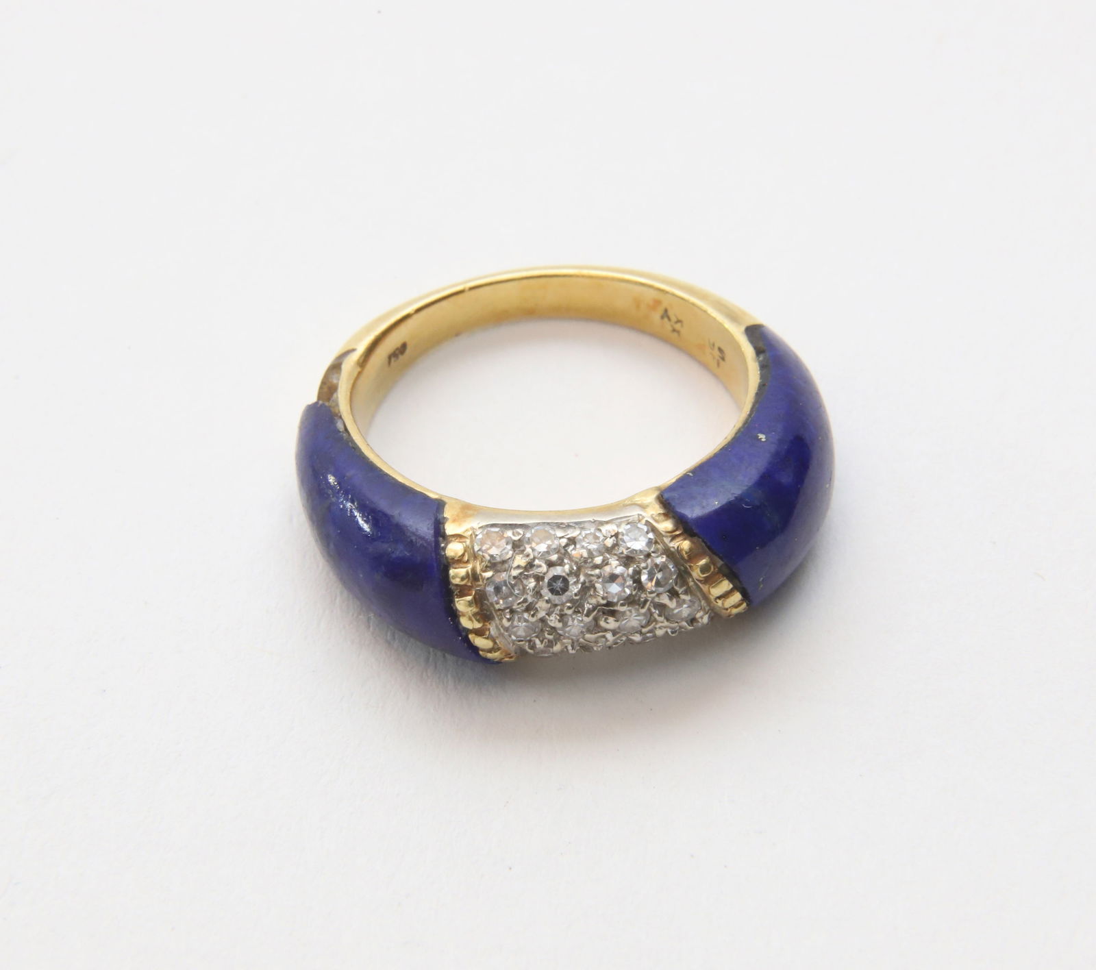 18k Gold Lapis and Diamond Ring, Set With 20 Small Diamonds: 18k Gold Lapis and Diamond Ring, Set With 20 Small Diamonds, 2mm size lapis missing from lower side of ring Size 5.5 Provenance: The Estate of Marguerite G. Dinan, Falmouth, Maine