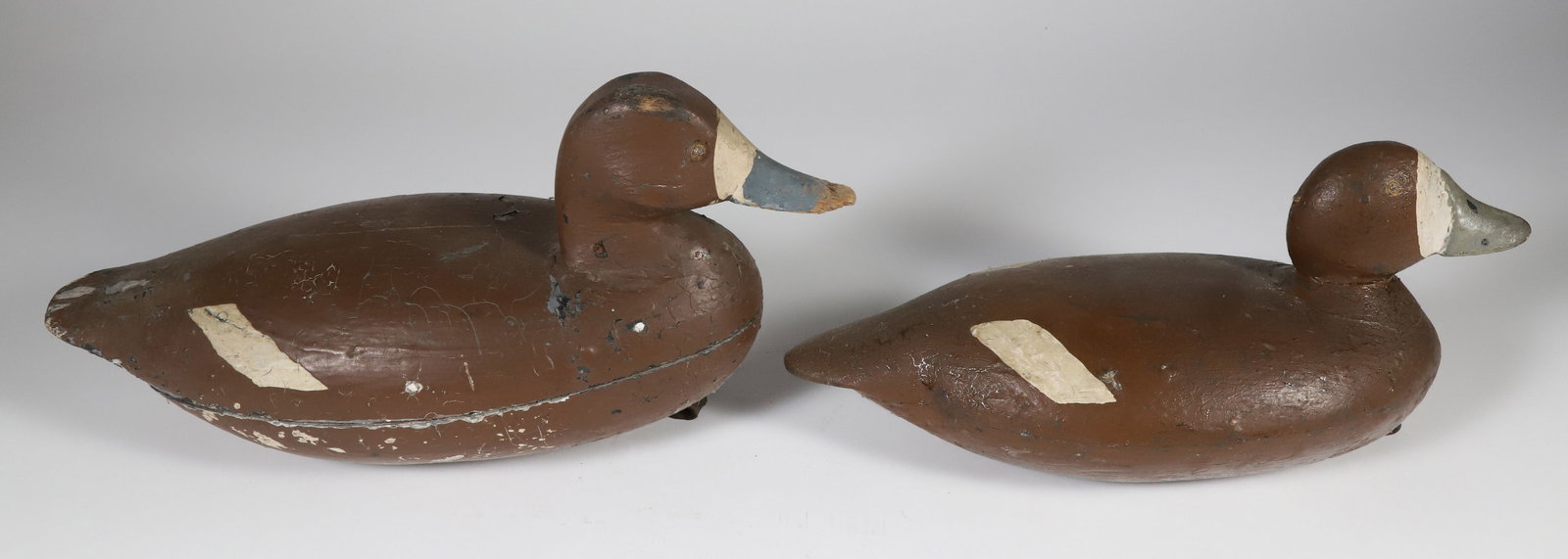 Two Hollow Body Duck Decoys: Two Hollow Body Duck Decoys Largest 7 in. x 13 in. x 6 in. Provenance: The Estate of Joly Walton Stewart, Shimmo, Nantucket Island, Massachusetts