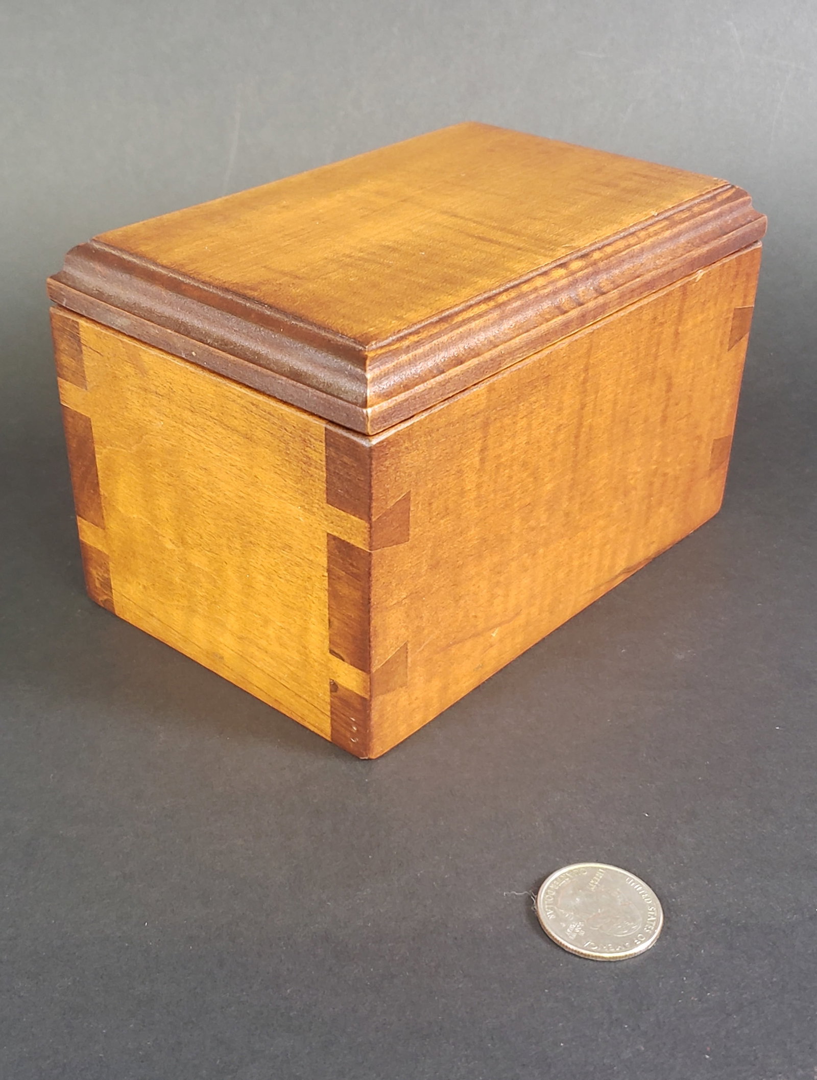 D.R. Dimes Hand Crafted Tiger Maple Lift Top Storage Box: D.R. Dimes Hand Crafted Tiger Maple Lift Top Storage Box, dovetailed construction, inscribed under lid, The Renée & Dan Plummer No Vet Left Behind Endowment Fund. Height 3.75 in. Width 6 in. Dept