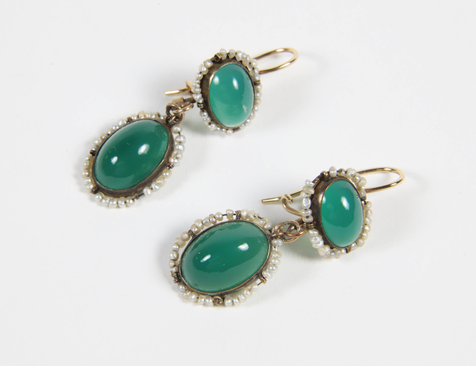Pair of Antique Seed Pearl and Green Cabochon Stones Dangle Earrings: Pair of Antique Seed Pearl and Green Cabochon Stones Dangle Earrings Length 1.25 in. Provenance: The Estate of Marguerite G. Dinan, Falmouth, Maine