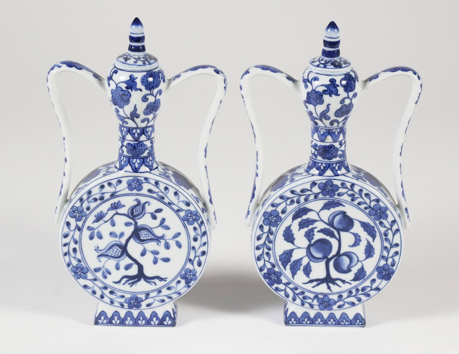 Pair of Chinese Export Blue and White Porcelain Covered Flask Jars (1 of 5)