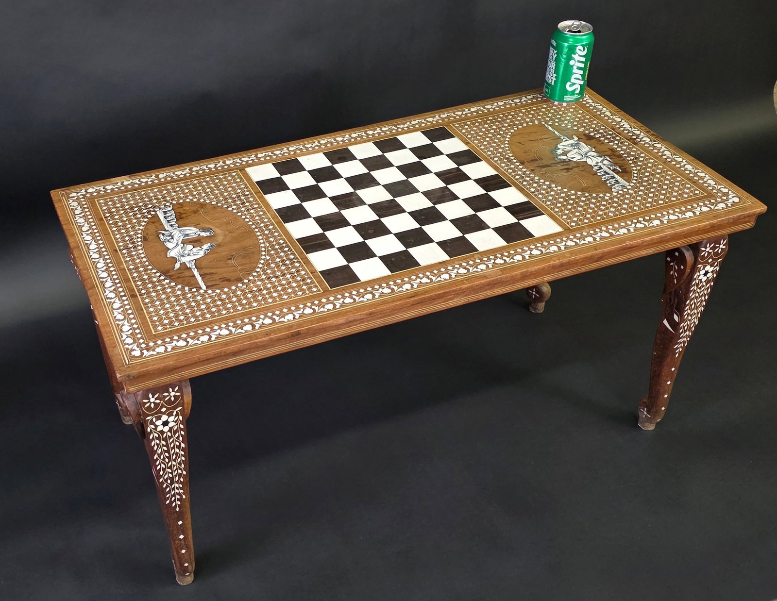 Vintage Anglo Indian Bone Inlaid Gambeboard Coffee Table, 20th century: Vintage Anglo Indian Bone Inlaid Gambeboard Coffee Table, 20th century, with figural elephant carved and inlaid legs, and a profusely inlaid top with figural courting couple inlay decorations. Height