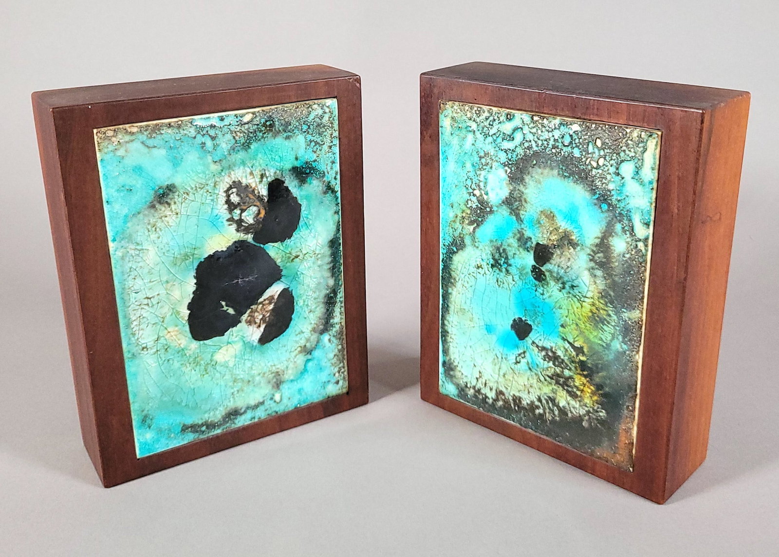 Pair of Mid Century Modern Walnut Ceramic Insert Bookends: Pair of Mid Century Modern Walnut Ceramic Insert Bookends, attributed to Gordon and Jane Martz, Marshall Studios, unmarked. Height 6.75 in. Width 5.25 in. Depth 1.75 in.